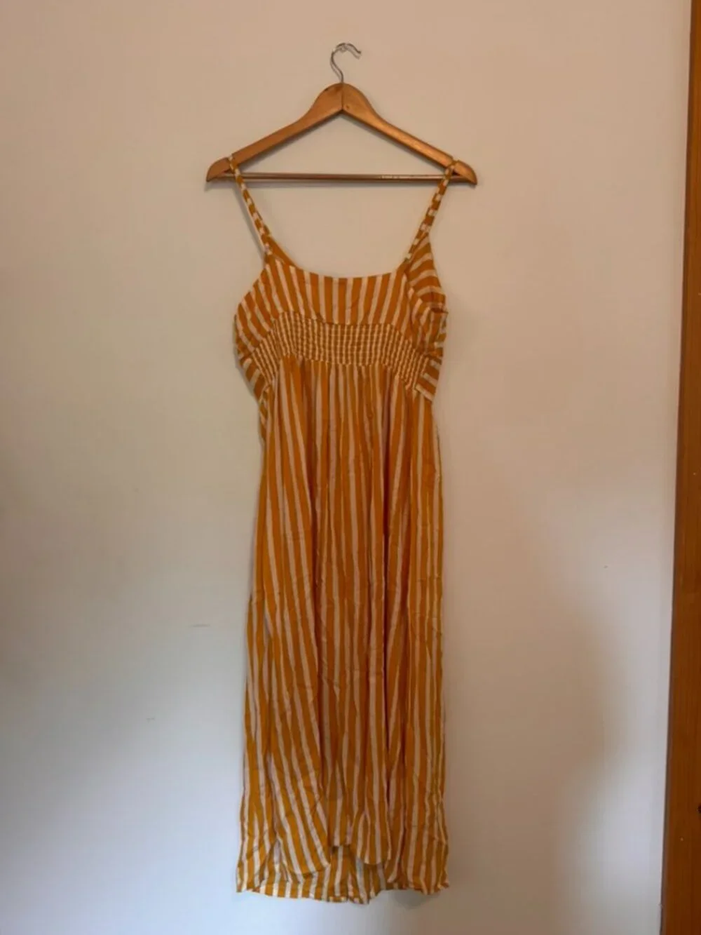 Yellow and white stripped dress with buttons and twist front